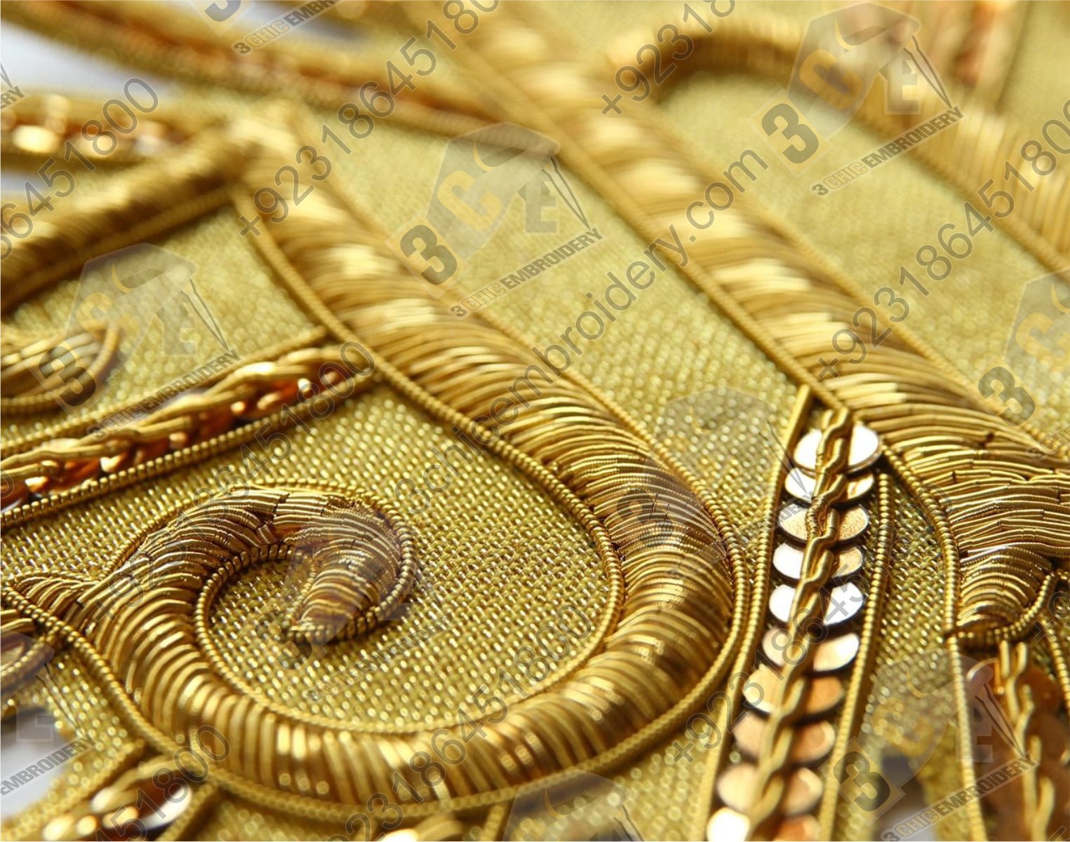 Hand embroidery process using gold thread and traditional techniques